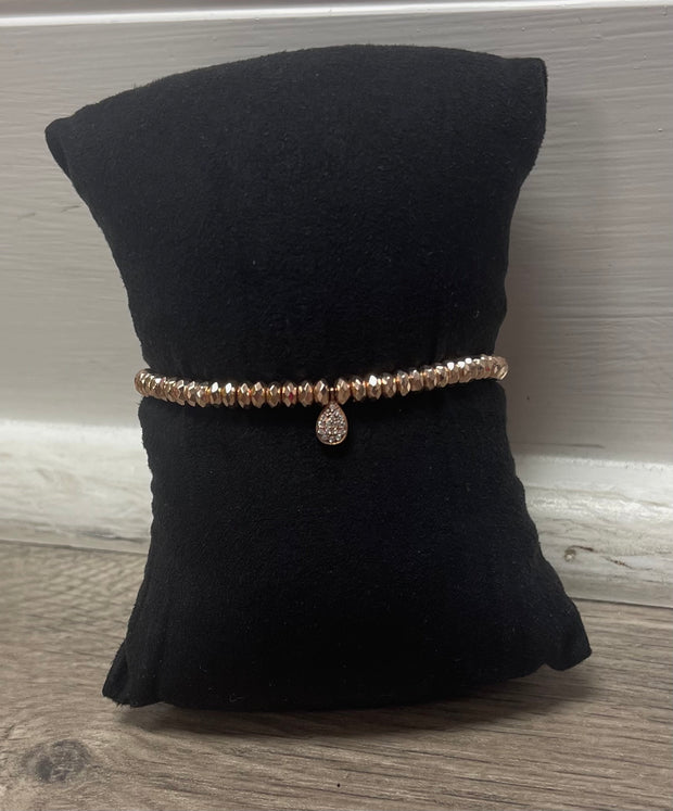 Rose gold stretch bracelet with charm