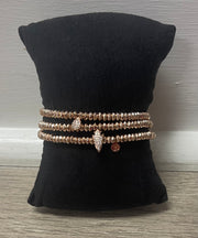 Rose gold stretch bracelet with charm